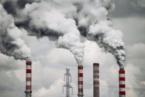 Industrial emissions releasing into the atmosphere indicating a dire need for carbon management plan.
